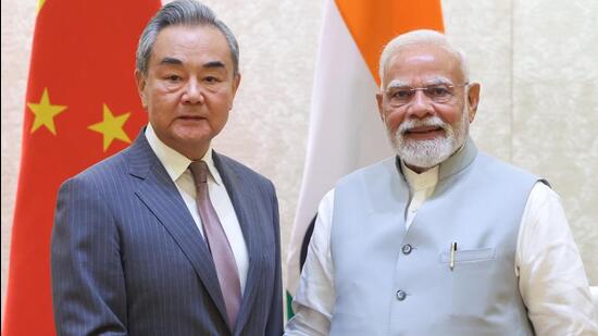 China Foreign Minister meet Modi